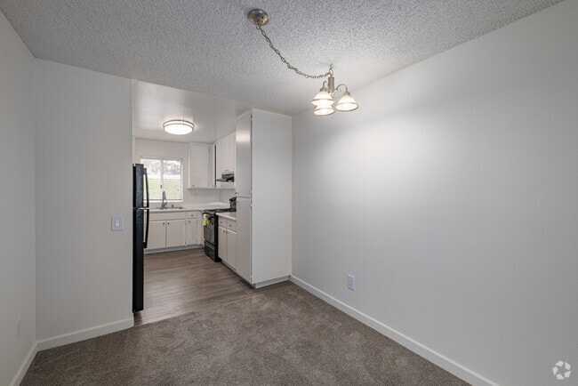2BR, 1.5BA - 970SF - Dining Room - Elan Village North