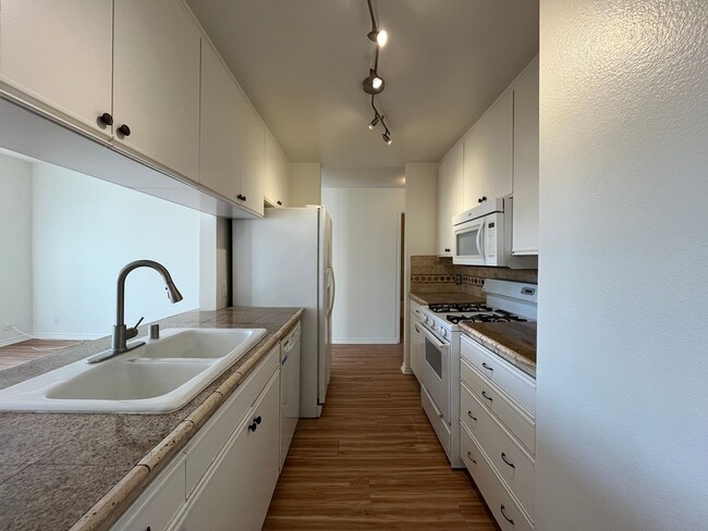 Photo - Upgraded 2+2 w/in-unit laundry + water + t...