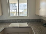 Kitchen Granite Counters - 7704 Romaine St Apartment Unit 8