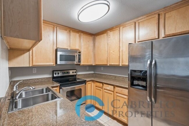 Building Photo - 3525 Grove St Unit 117