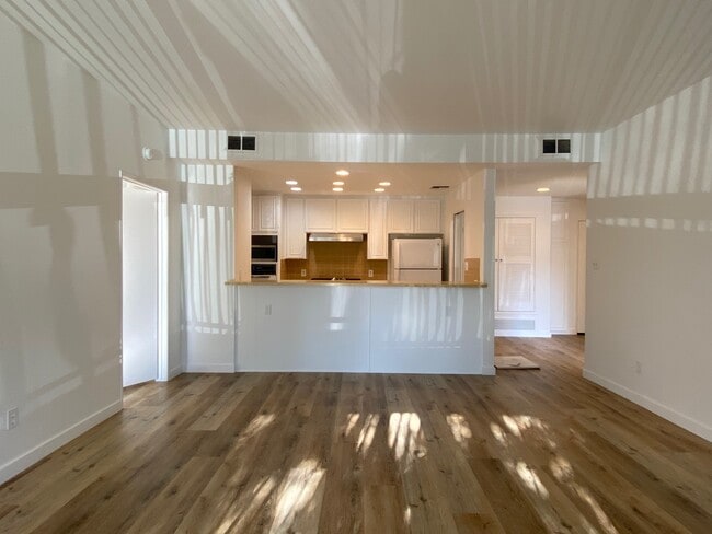 LR to Kitchen view - 104 S Hayworth Ave Unit 106