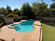 Kidney shaped pool and jacuzzi - 23446 Blythe St House