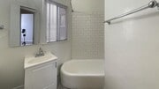 Photo - Budlong Apartments...Newly Renovated Studio...Hardwood Floors! CALL NOW! Unit 2410 D