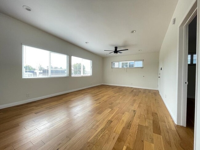 living room from other end - 7855 W Manchester Ave Unit 3