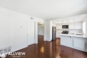 Photo - Fully Renovated 2 Bed Townhome with Private Patio, 2-Car Garage & Community Pool