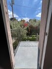 Private Balcony Overlooking Patio - 826 1/2 N Coronado st Apartments