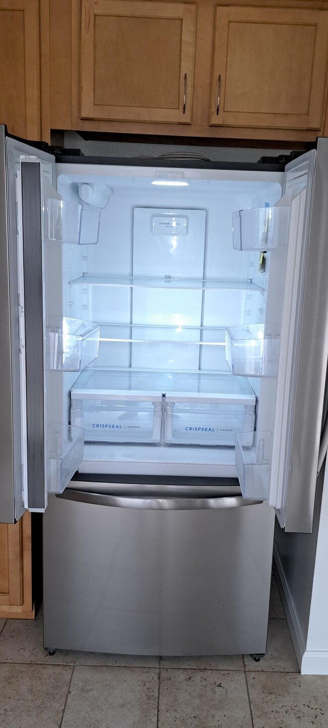 Inside of new refrigerator with french doors - 314 20th St Unit D
