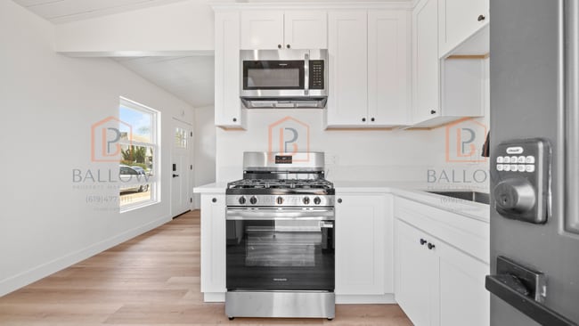 Building Photo - 4880-82 Cole St Unit 4882