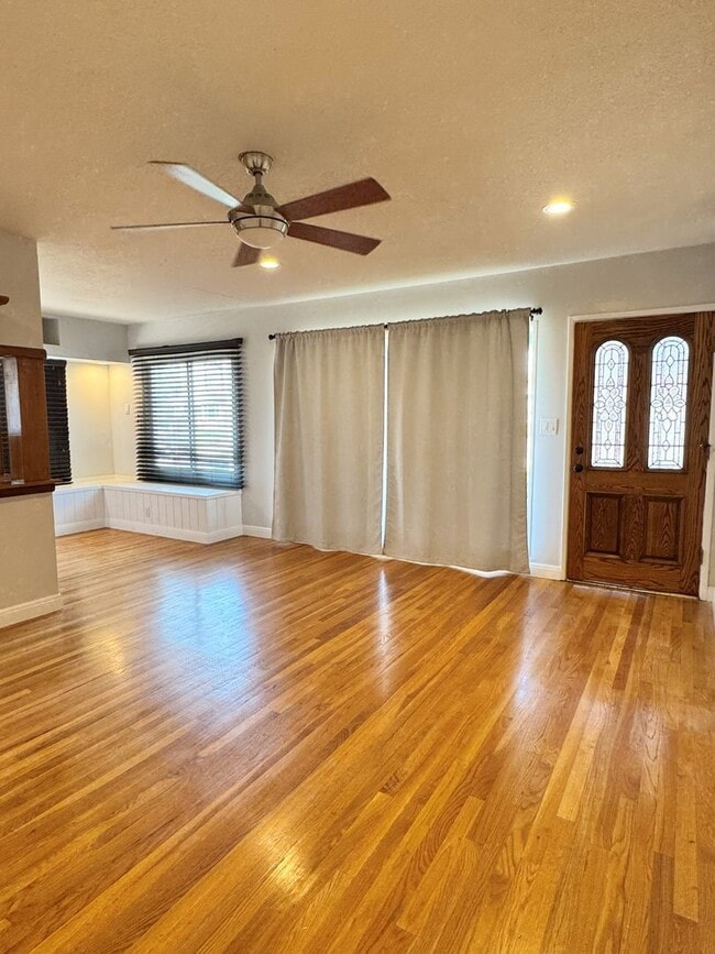 Photo - Charming 2-Bedroom Home with Fireplace, Backyard & Garage in Lakewood