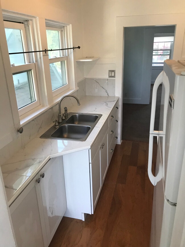 Kitchen w/ new cabinets and stove - 1011 1/2 N Coronado St Unit 1011 .5