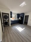 Kitchen/Laundry - NASA Living LLC Apartments