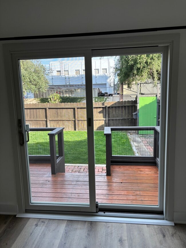 Deck and view of front yard - 713 Amoroso Pl Unit 713