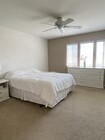 Furniture placement by a previous resident in bedroom #1 - 1322 Garnet Ave Unit 201