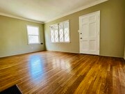 FRONT ROOM - 1738 Carmona Ave Apartments
