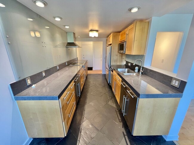 Photo - Modern 2 bedroom Gem Near Bixby Park | Private Balcony & Secured Parking Unit 206