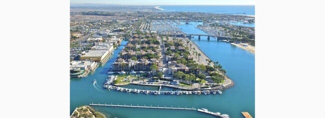 Building Photo - 8124 Marina Pacifica Dr N Unit Marina Retreat inc. utl.