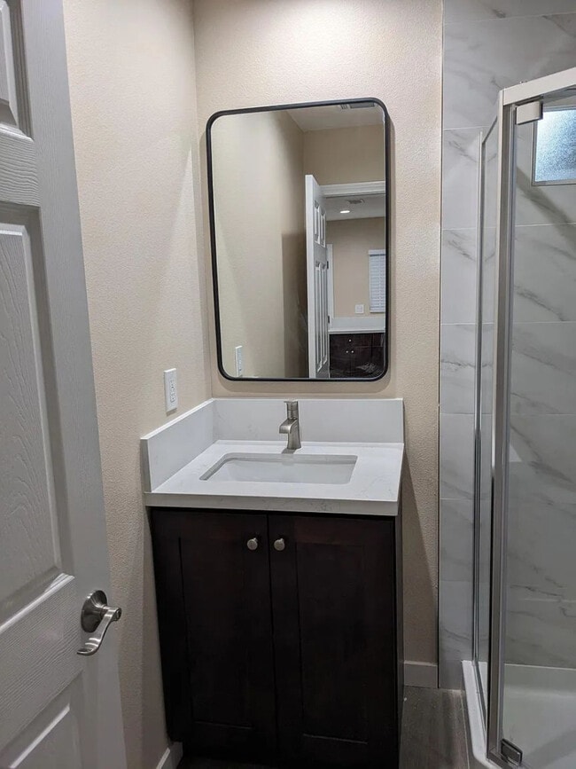 Building Photo - Charming 1-Bed with Private Patio & In-Unit Laundry — Central A/C, Parking, and All Major Applian... Unit B