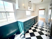 Kitchen with large farmhouse sink. - 1327 N Central Ave Unit #F