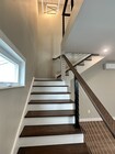 Hardwood stairs with modern cable railing - 5642 Printwood Way