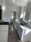 Newer kitchen and full bathroom off hallway - 2823 Hermosa Ave Unit 2823