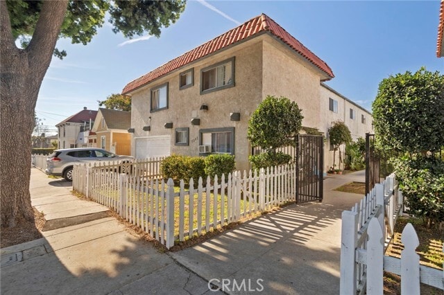 Building Photo - 7243 Milton Ave Unit 12