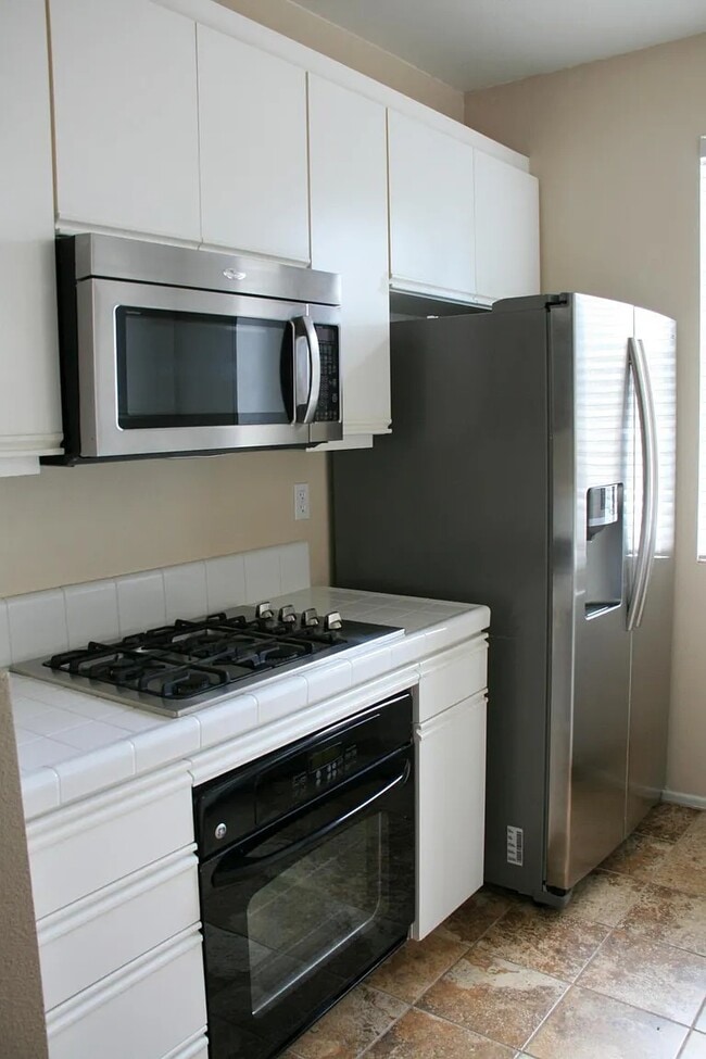 Building Photo - 10830 Sabre Hill Dr #201 Rental
