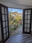 French door exit to patio area - 2615 Obama Blvd Unit one half