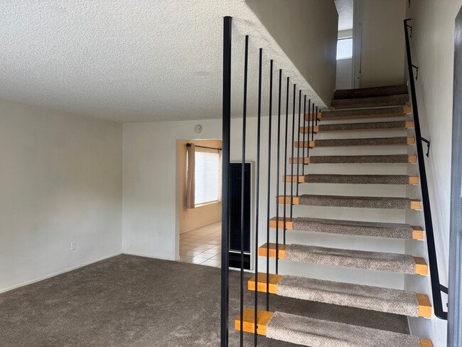 Living room/stairs - 2014 Nelson Ave Unit A