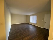 Living Room with Vinyl Plank - 225 W. Verdugo Apartments