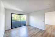 1BR, 1BA - 650SF - Living Room - 11817 Victory Blvd