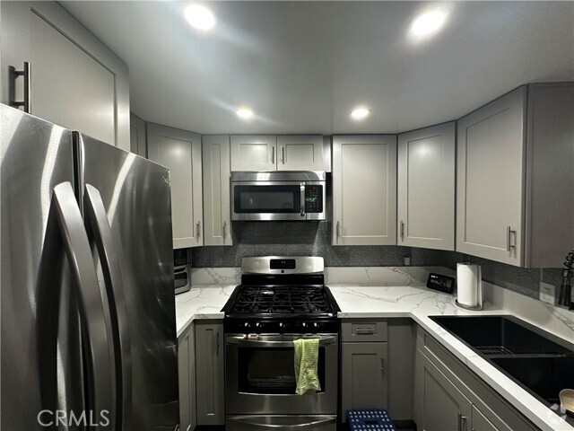Building Photo - 700 E 3rd St Unit A105 Rental