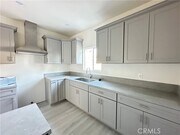 Photo - 1515 W 147th St Townhome
