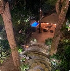 Backyard spa and gazebo at night - 4050 Davana Rd House
