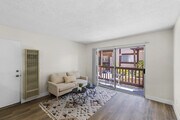 1BR, 1BA - 600SF - Living Room - Collins Condominiums