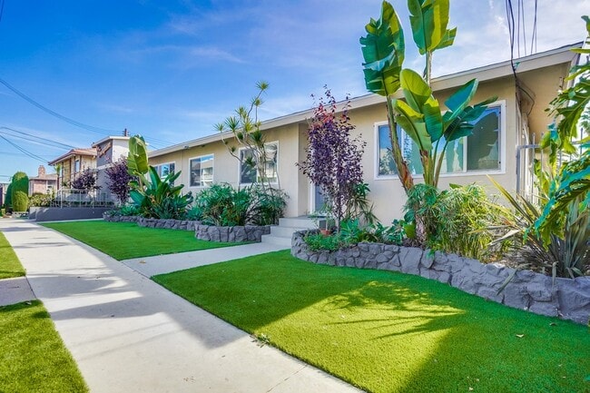 Outside POV - Retro Style Apartment Building with Pool and Gym - Secure, Modern and Lease-Ready!