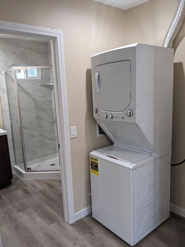 Photo - Charming 1-Bed with Private Patio & In-Unit Laundry — Central A/C, Parking, and All Major Applian... Unit B