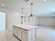 Photo - Stunning and Spacious 6BR 5BA Home w/ Solar Panels + Quartz Counter + Fenced Yard + 2 Car Garage ...