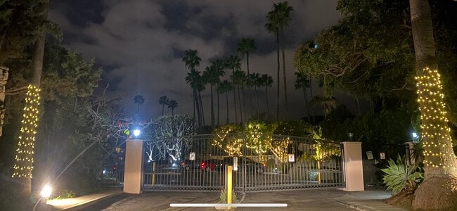 Elegant evening ambiance with security gate access - 241 S Barrington Ave Unit 4