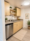AI Staged Kitchen - 425 W Beech St Unit 208