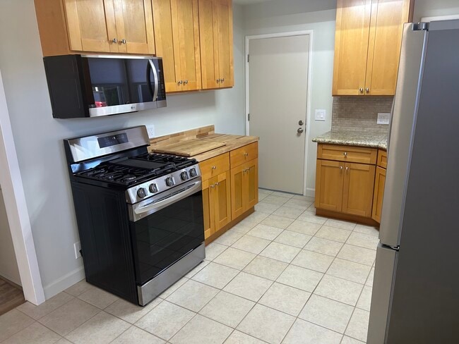 Kitchen with new appliances - 2021 Ocean Park Blvd Apartments Unit Front