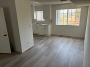 Dining area with south facing window and Ceiling Fan - 18071 Beneda Ln Apartments Unit 206