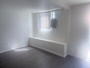 Living area with window AC - 1423 Mohawk St Unit 1