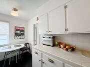 full kitchen with breakfast nook - 4717 Druid St