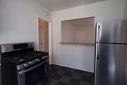 Kitchen pass through - 819 E Edgeware Rd