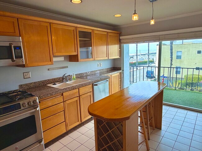 View from Kitchen and Balcony with Ocean/Pier views - 1649 Appian Way Unit #210