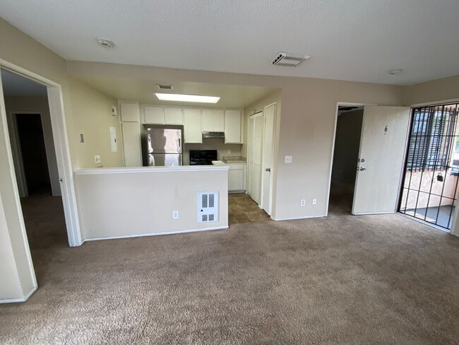 Photo - 2 BR 2 BA Corner Condo w/Balcony W/D Gated Entry Carport + Space Unit 6