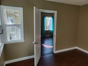 Bedroom leading to living room - 6414 10th Ave Unit 6414