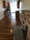 Living room to dining area and kitchen - 12607 Collins St