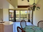 Photo - Private Oasis with Sunroom, Balcony & Lush Landscaping | 4BR Home Near Community Pool & Spa