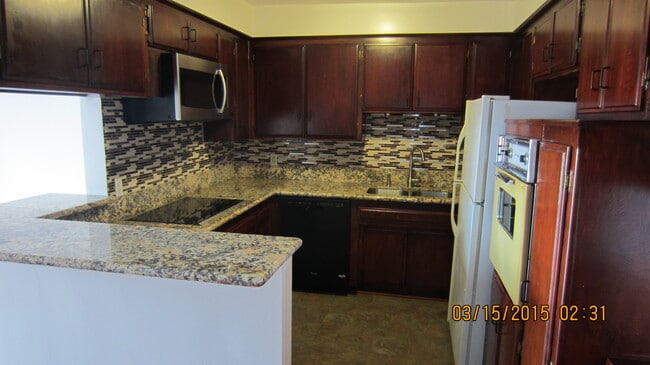 Building Photo - 10961 Palms Blvd Unit 8